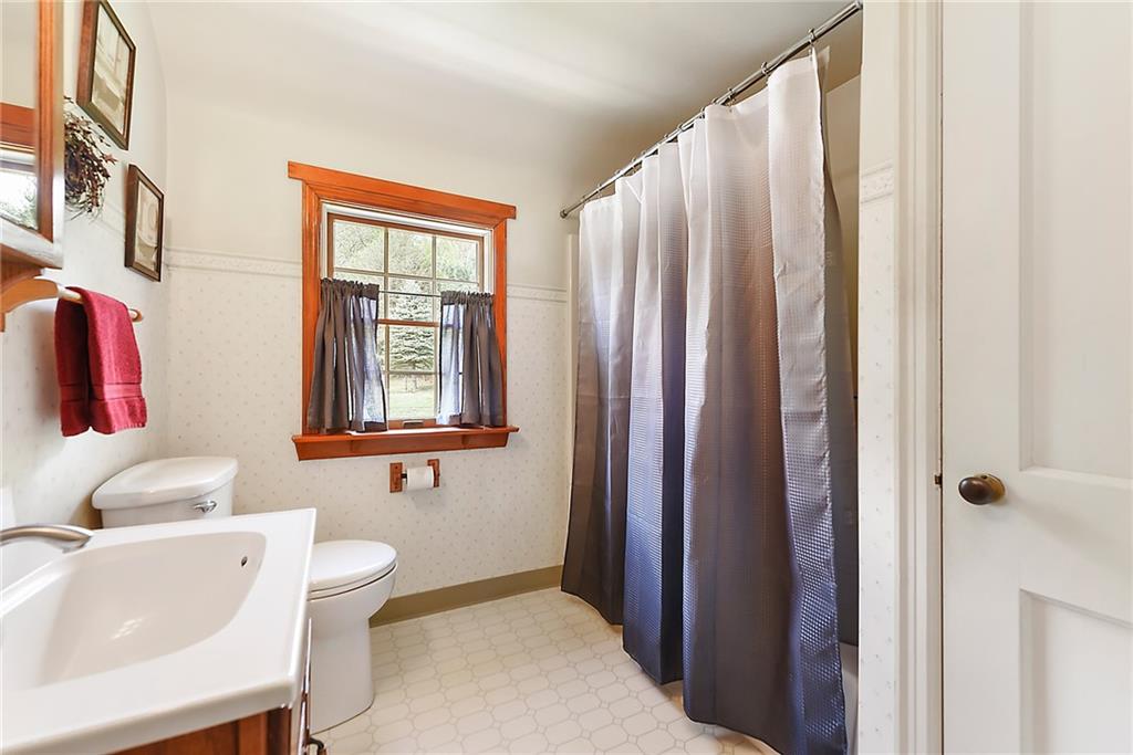 292 Moon Clinton Road Coraopolis, PA 15108 - Photo 24 of 34 a bathroom with a sink toilet and shower