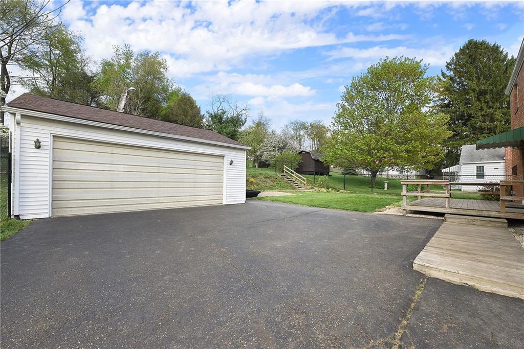 292 Moon Clinton Road Coraopolis, PA 15108 - Photo 33 of 34 a view of a house with backyard and trees