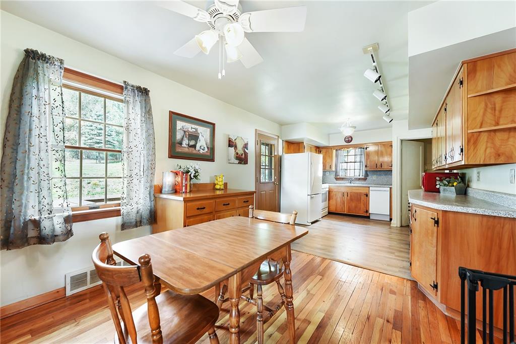 292 Moon Clinton Road Coraopolis, PA 15108 - Photo 7 of 34 a view of a dining room with furniture window and wooden floor