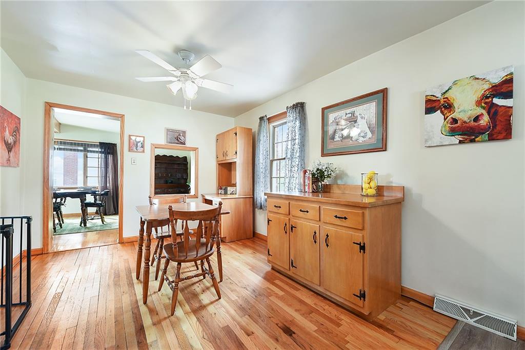 292 Moon Clinton Road Coraopolis, PA 15108 - Photo 8 of 34 a view of a dining room with furniture window and wooden floor