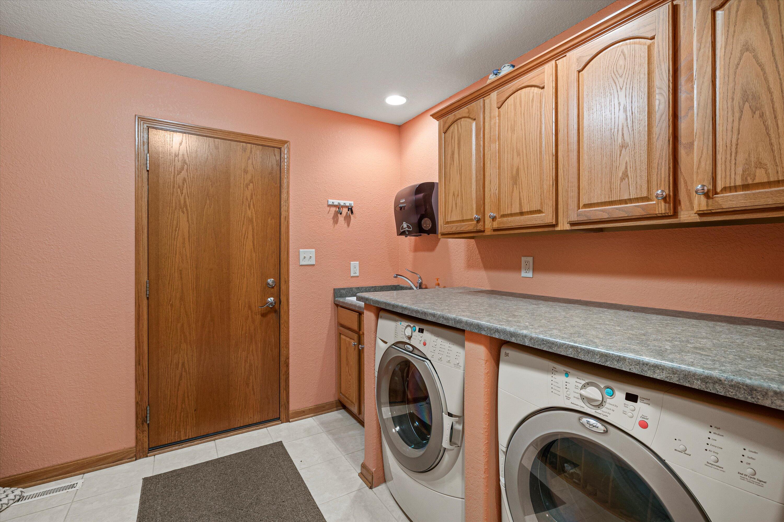 1855 River Lakes Road South Oconomowoc, WI 53066 - Photo 24 of 40 Laundry Main Level