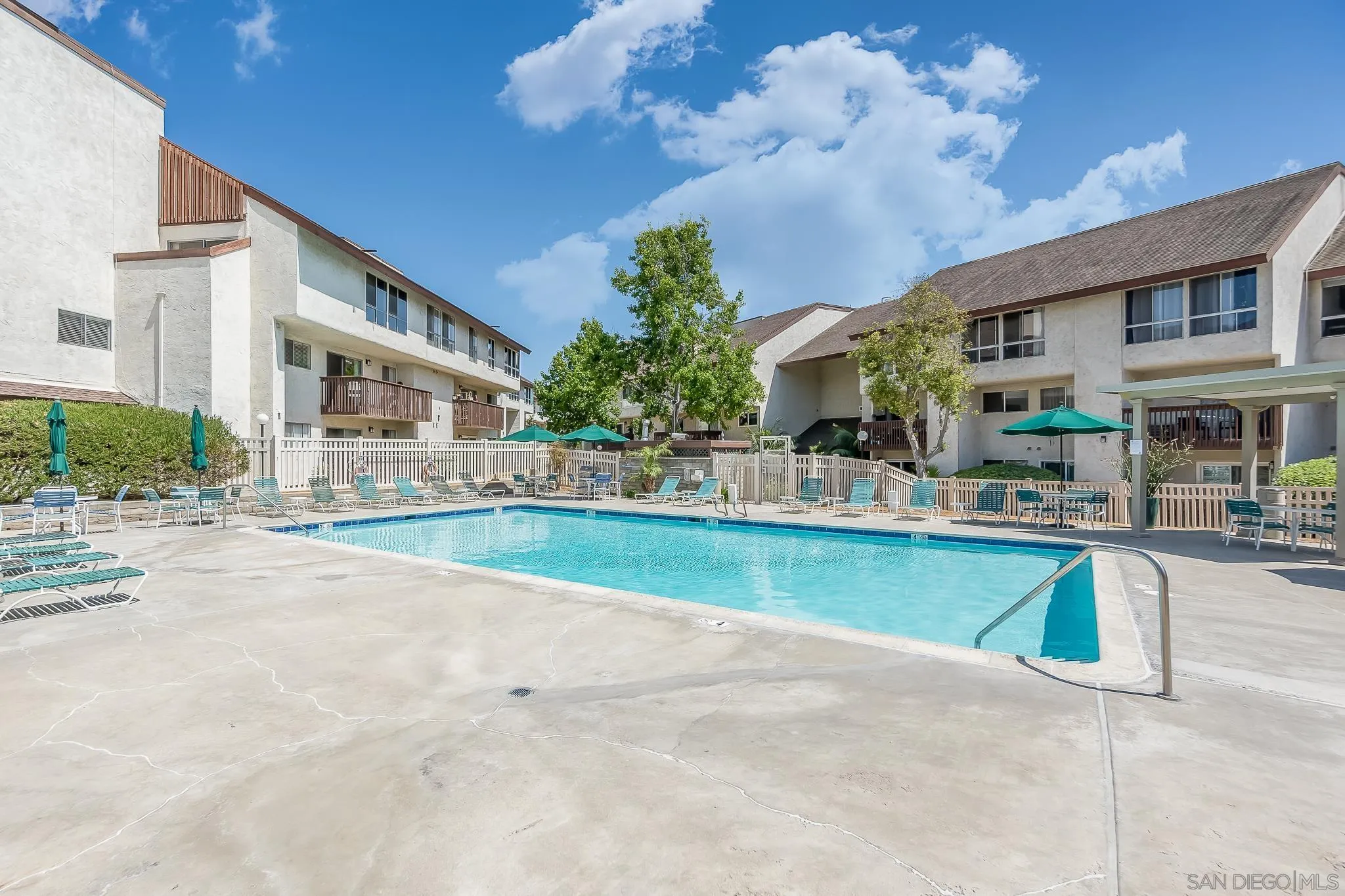 6111 Rancho Mission Road, Unit 101 San Diego, CA 92108 - Photo 24 of 30 a view of a building with a swimming pool