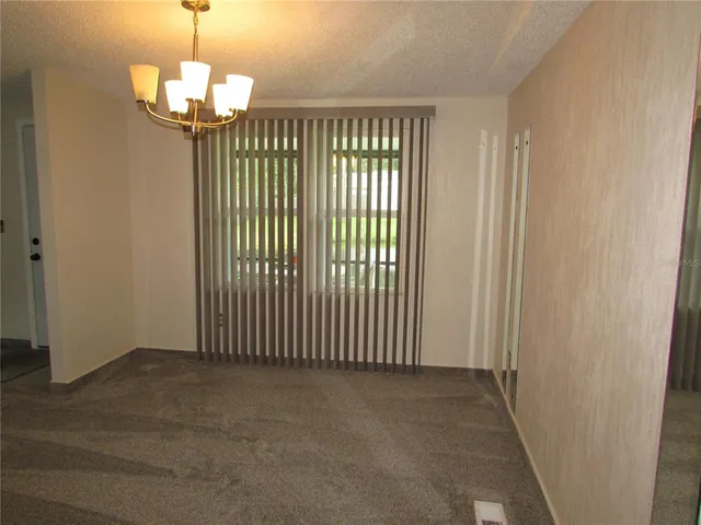 a kitchen with stainless steel appliances granite countertop a sink stove and microwave