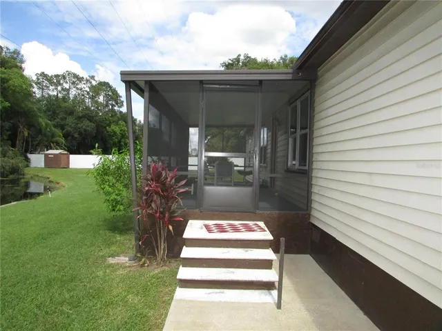 a view of garden with outdoor seating