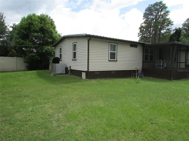 a view of a backyard with a garden