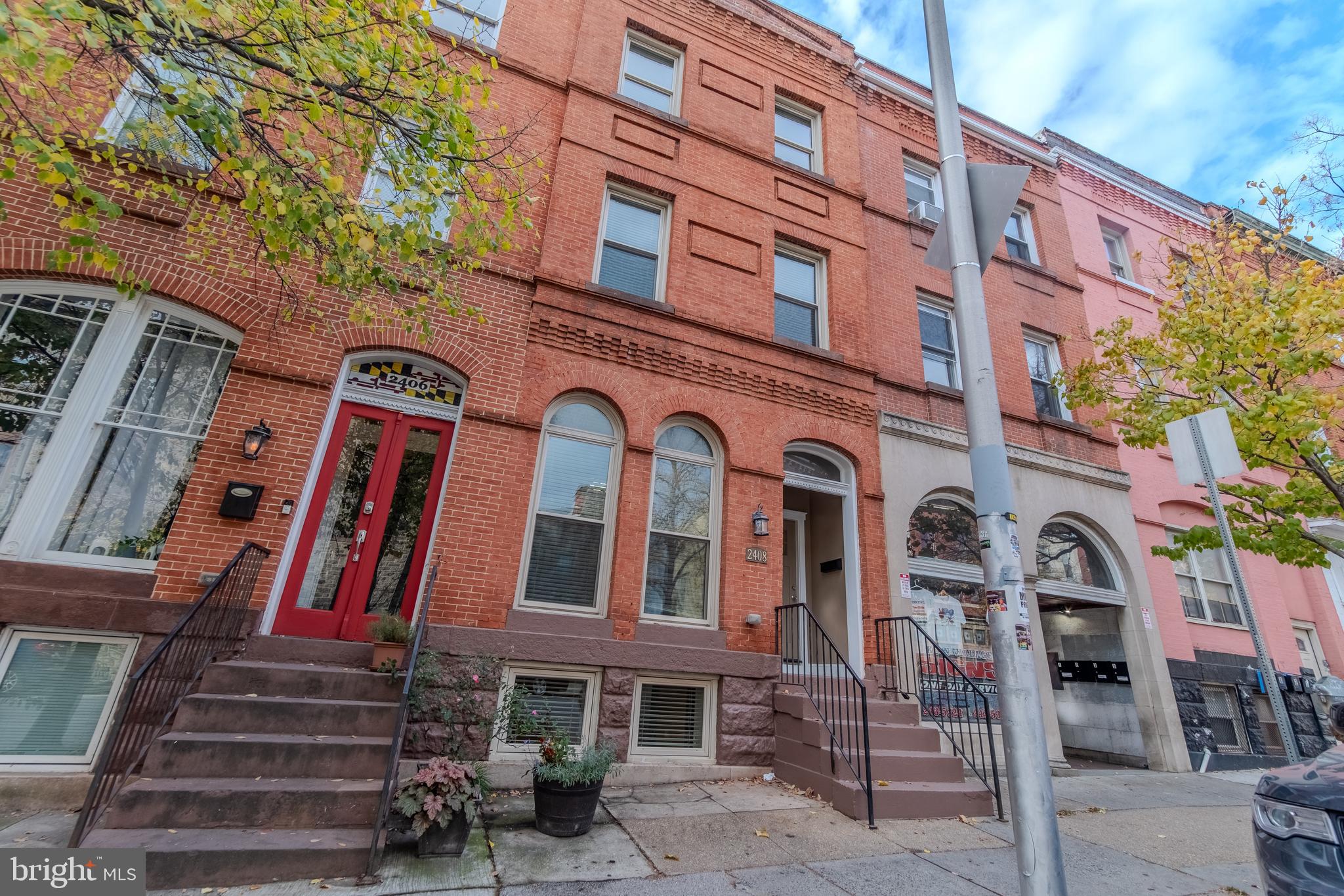 2408 St Paul Street Baltimore, MD 21218 - Photo 1 of 35 a front view of a building