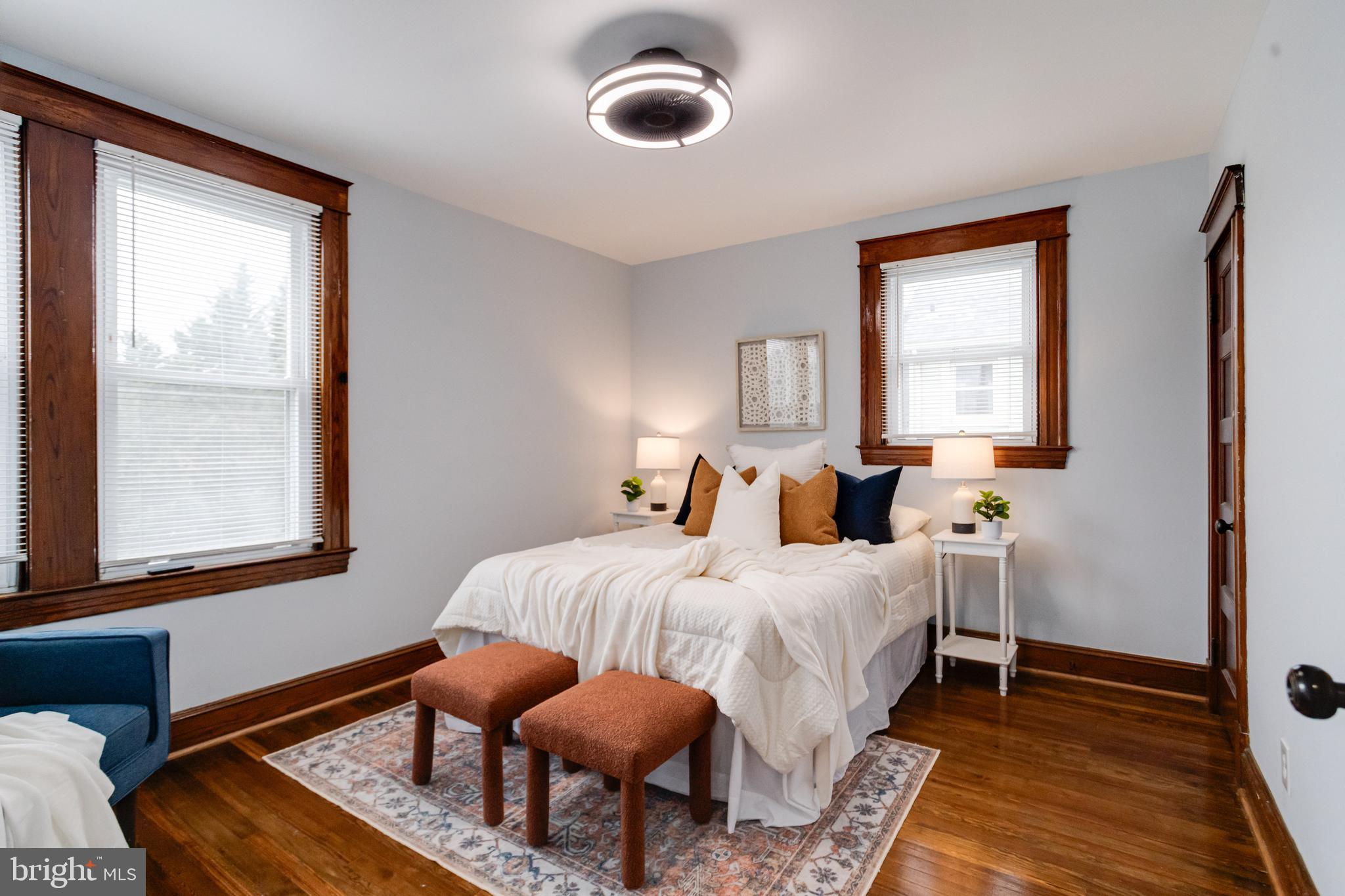 7932 Philadelphia Road Baltimore, MD 21237 - Photo 20 of 44 a bedroom with bed and window
