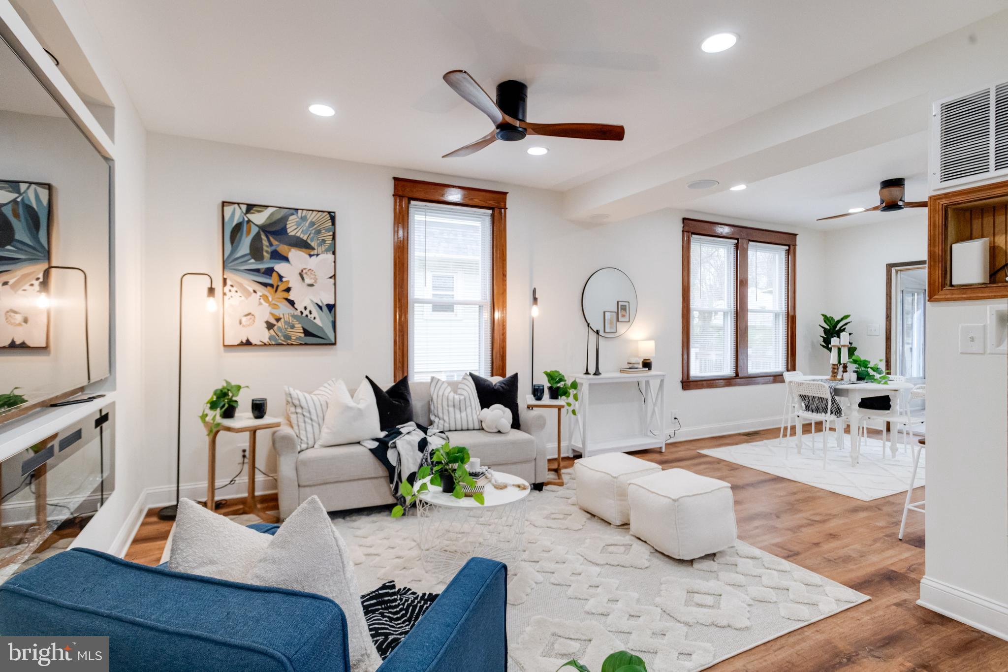 7932 Philadelphia Road Baltimore, MD 21237 - Photo 2 of 44 a living room with furniture and a large window