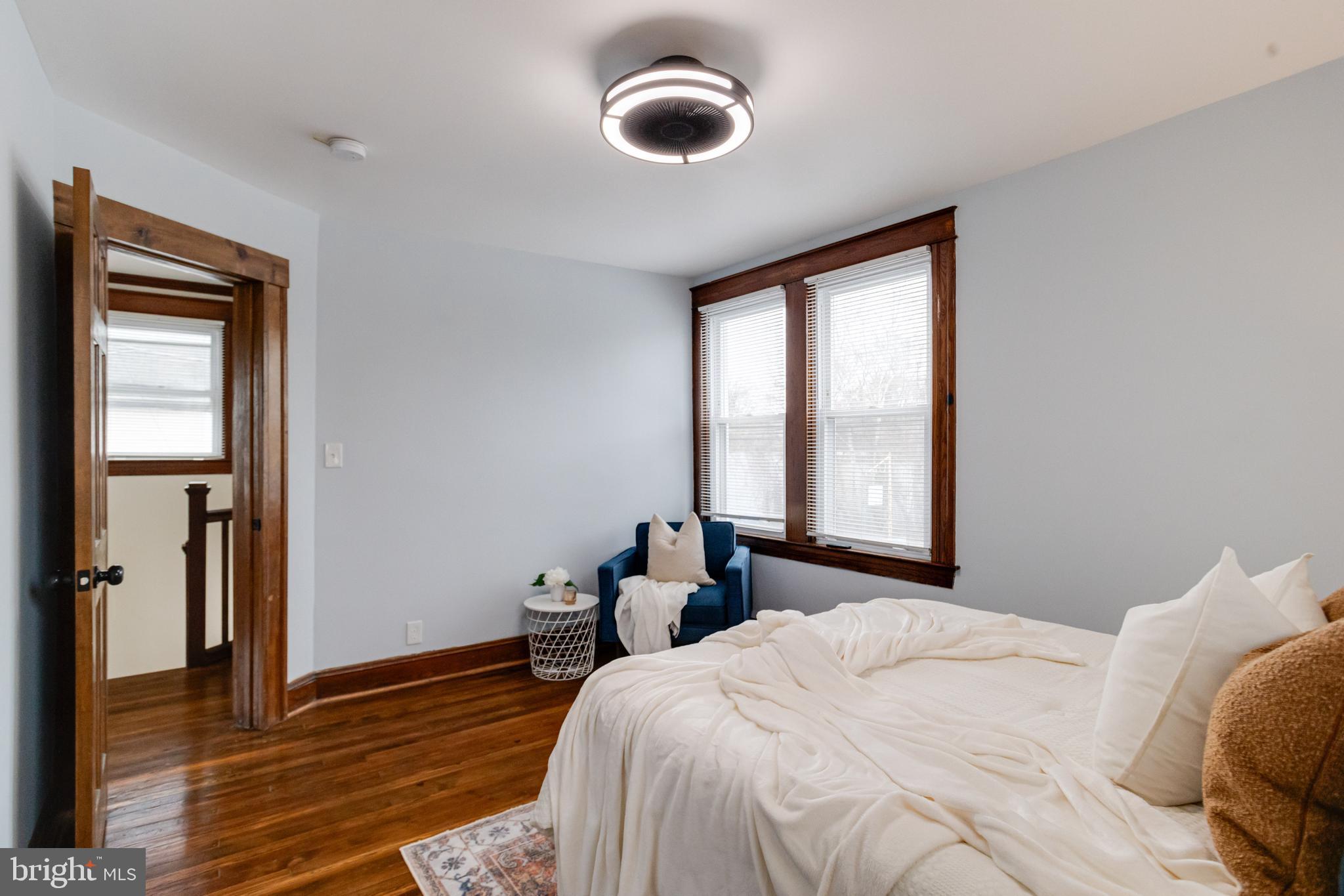 7932 Philadelphia Road Baltimore, MD 21237 - Photo 21 of 44 a bedroom with a bed and window