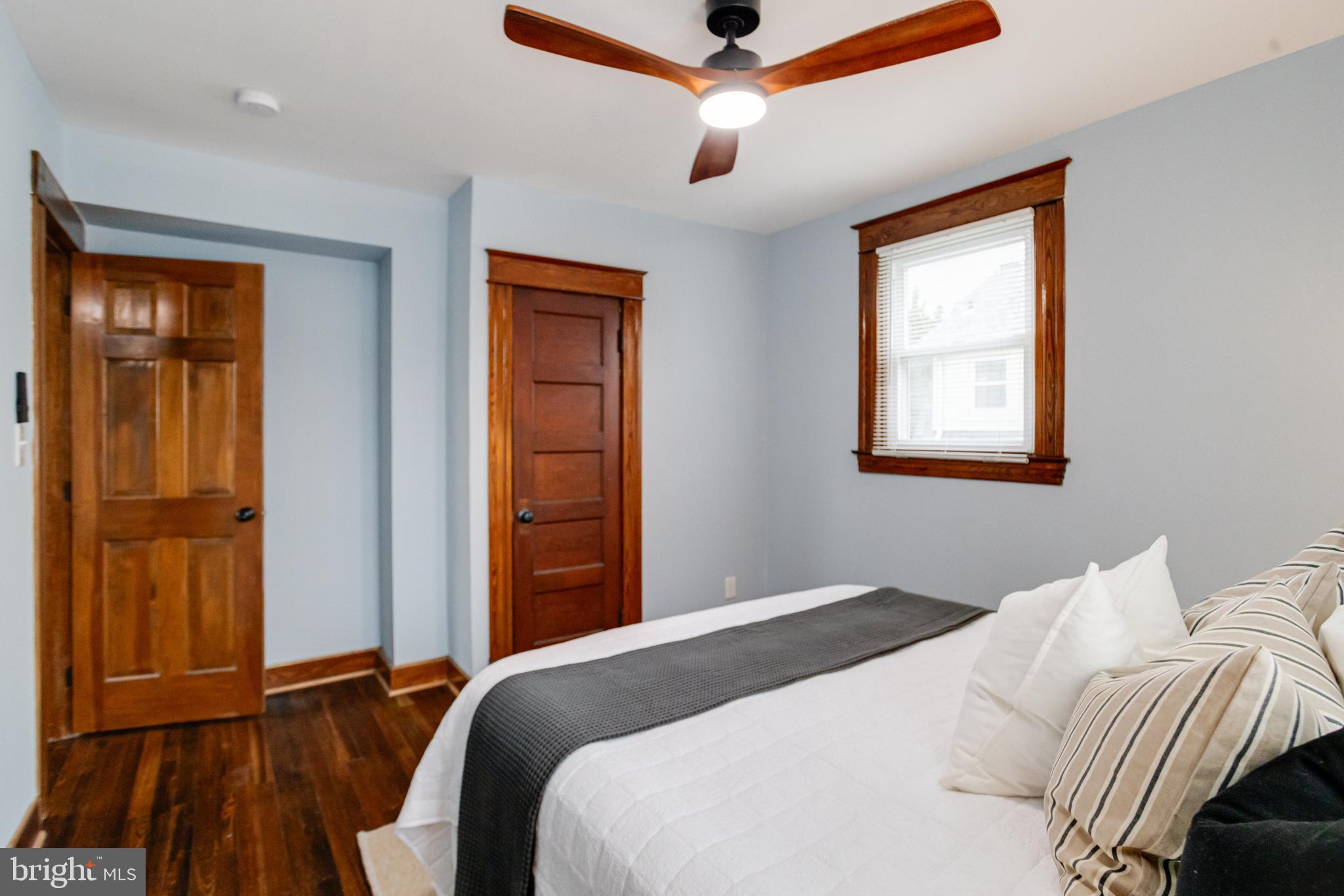 7932 Philadelphia Road Baltimore, MD 21237 - Photo 23 of 44 a bedroom with a bed and a window