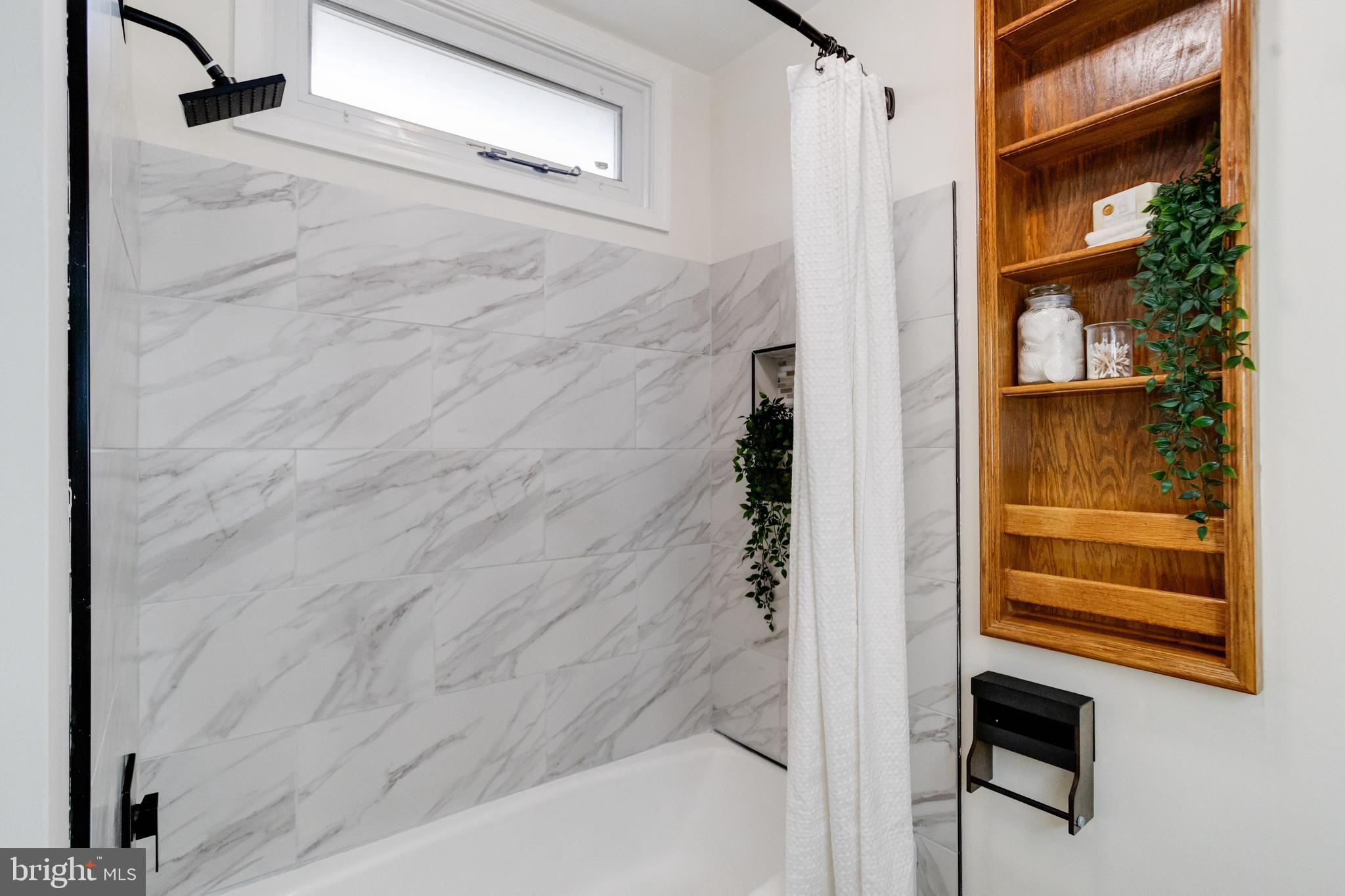 7932 Philadelphia Road Baltimore, MD 21237 - Photo 27 of 44 a bathroom with a shower