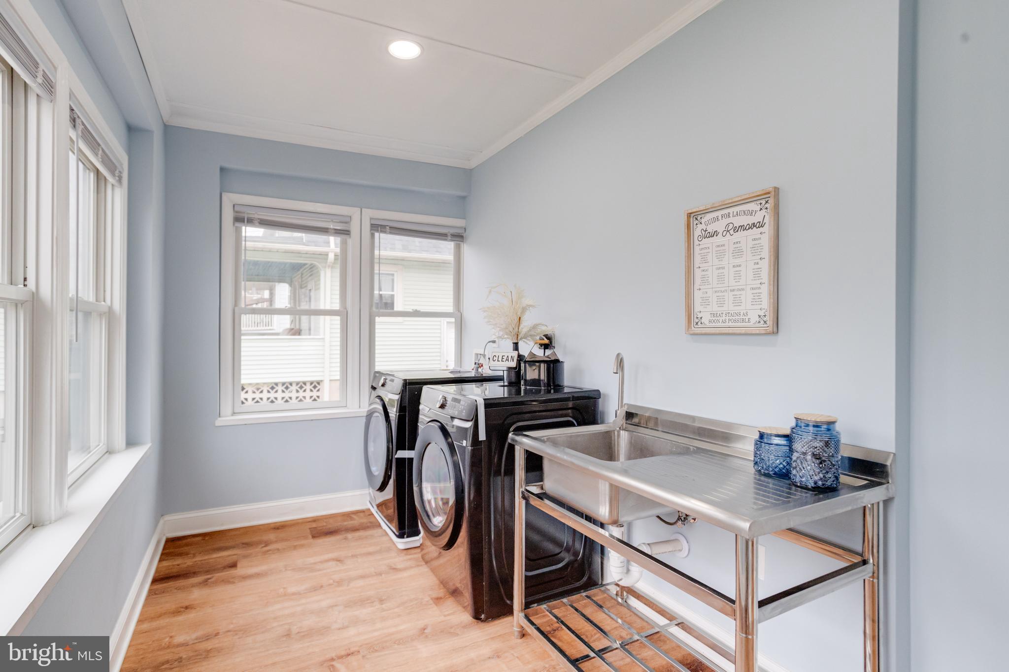 7932 Philadelphia Road Baltimore, MD 21237 - Photo 5 of 44 a view of a workspace with furniture and a window