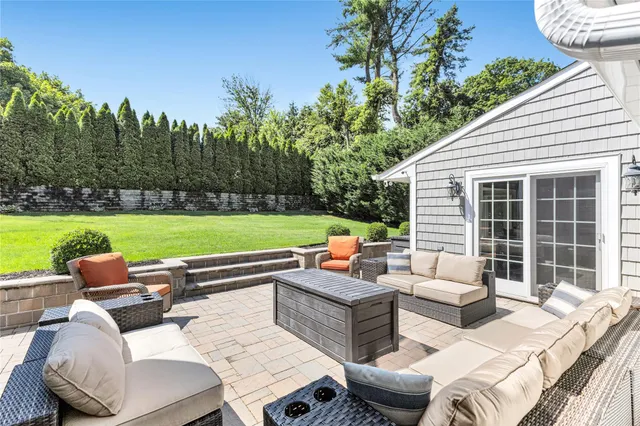 a outdoor living space with furniture and garden