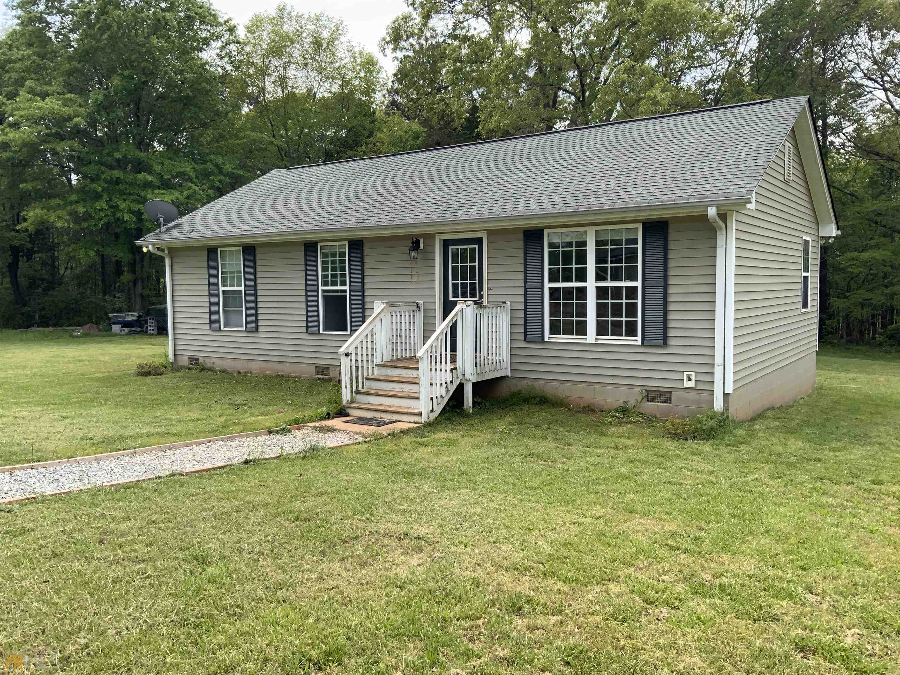 48 Lois Kinney Road Statham, GA 30666 - Photo 1 of 1 a view of a house with a yard