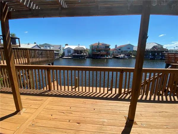 a balcony with wooden floor