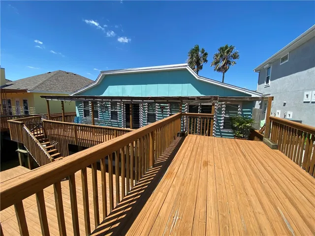 a view of balcony with a deck