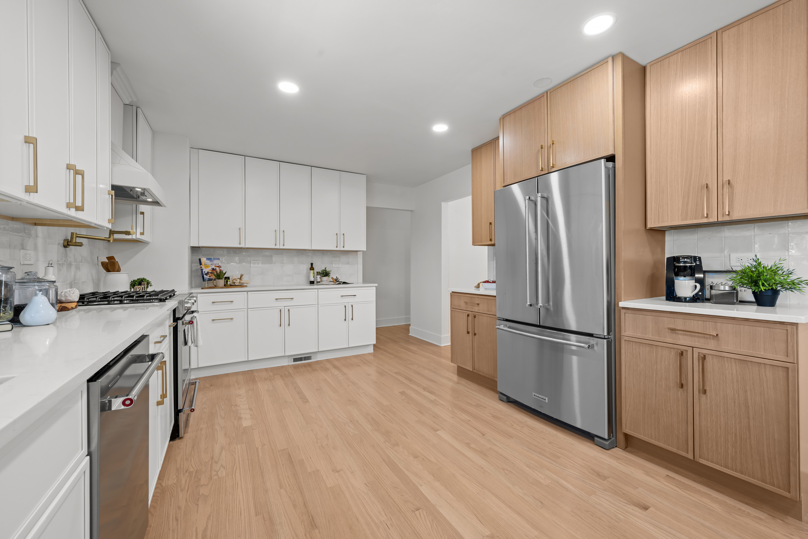 1405 West Street Naperville, IL 60563 - Photo 13 of 43 a kitchen with stainless steel appliances a refrigerator sink and cabinets