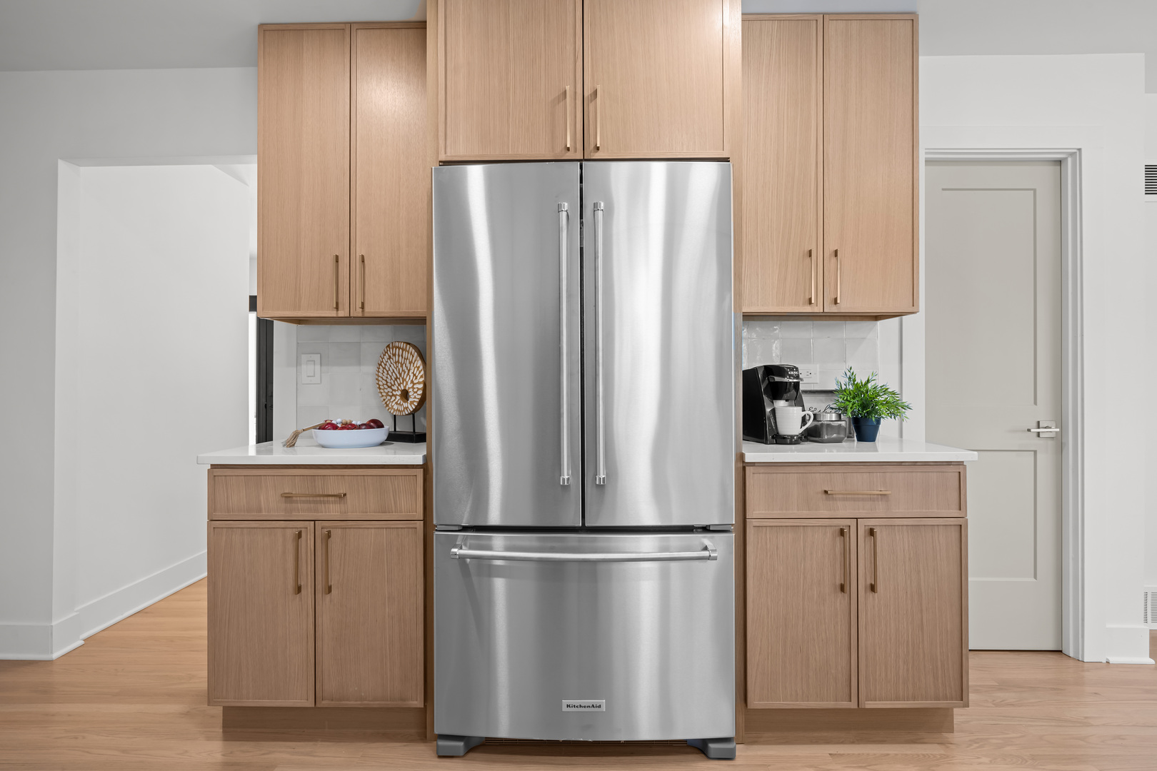 1405 West Street Naperville, IL 60563 - Photo 14 of 43 a white refrigerator freezer sitting in a kitchen