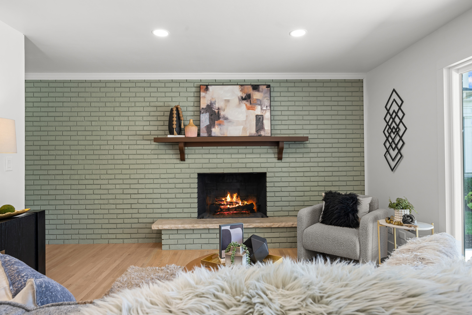 1405 West Street Naperville, IL 60563 - Photo 18 of 43 a living room with furniture and a fireplace