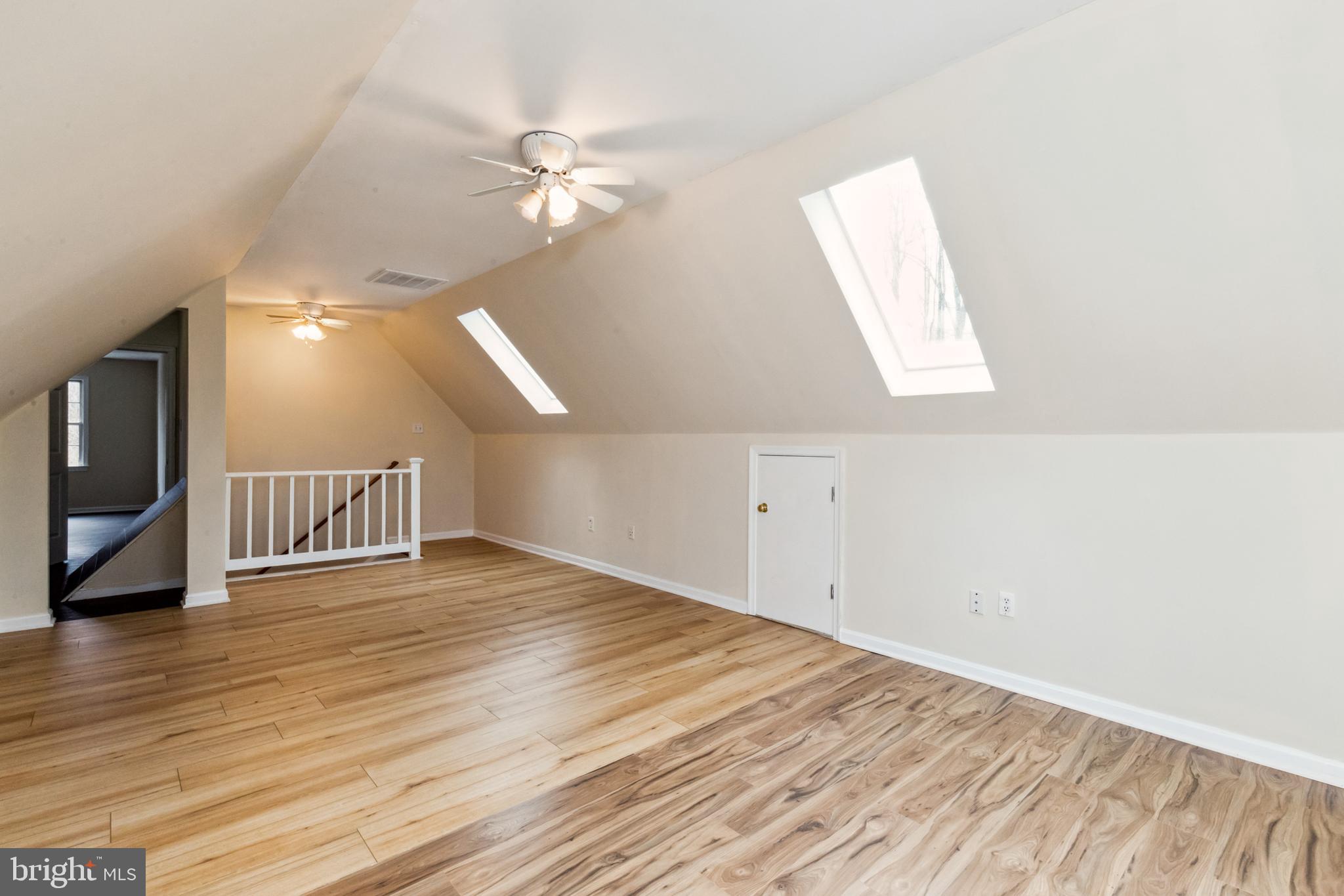 13157 Mt Paran Church Road Linden, VA 22642 - Photo 14 of 27 a view of an empty room with wooden floor and a window