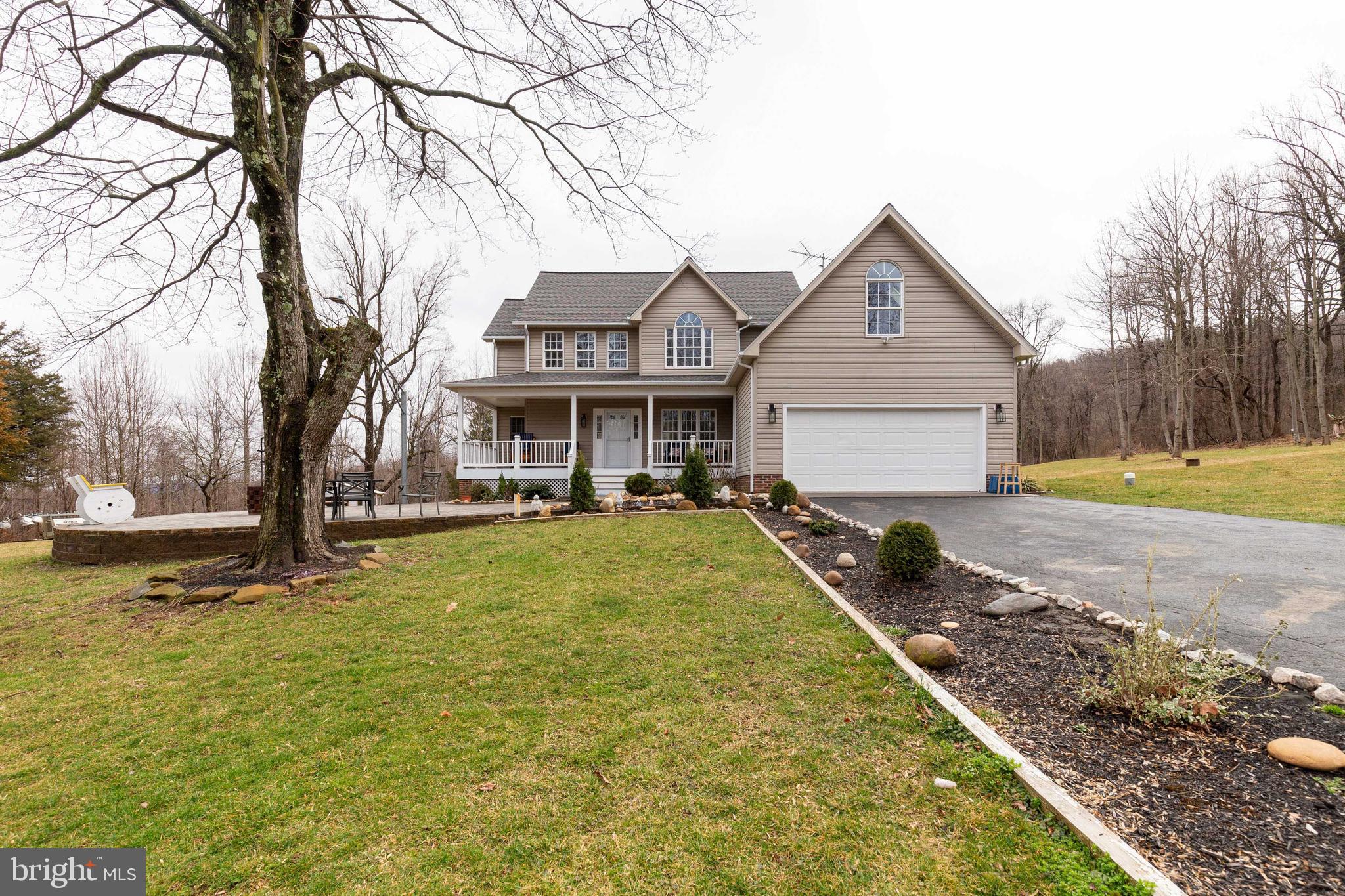 13157 Mt Paran Church Road Linden, VA 22642 - Photo 2 of 27 a front view of a house with a yard