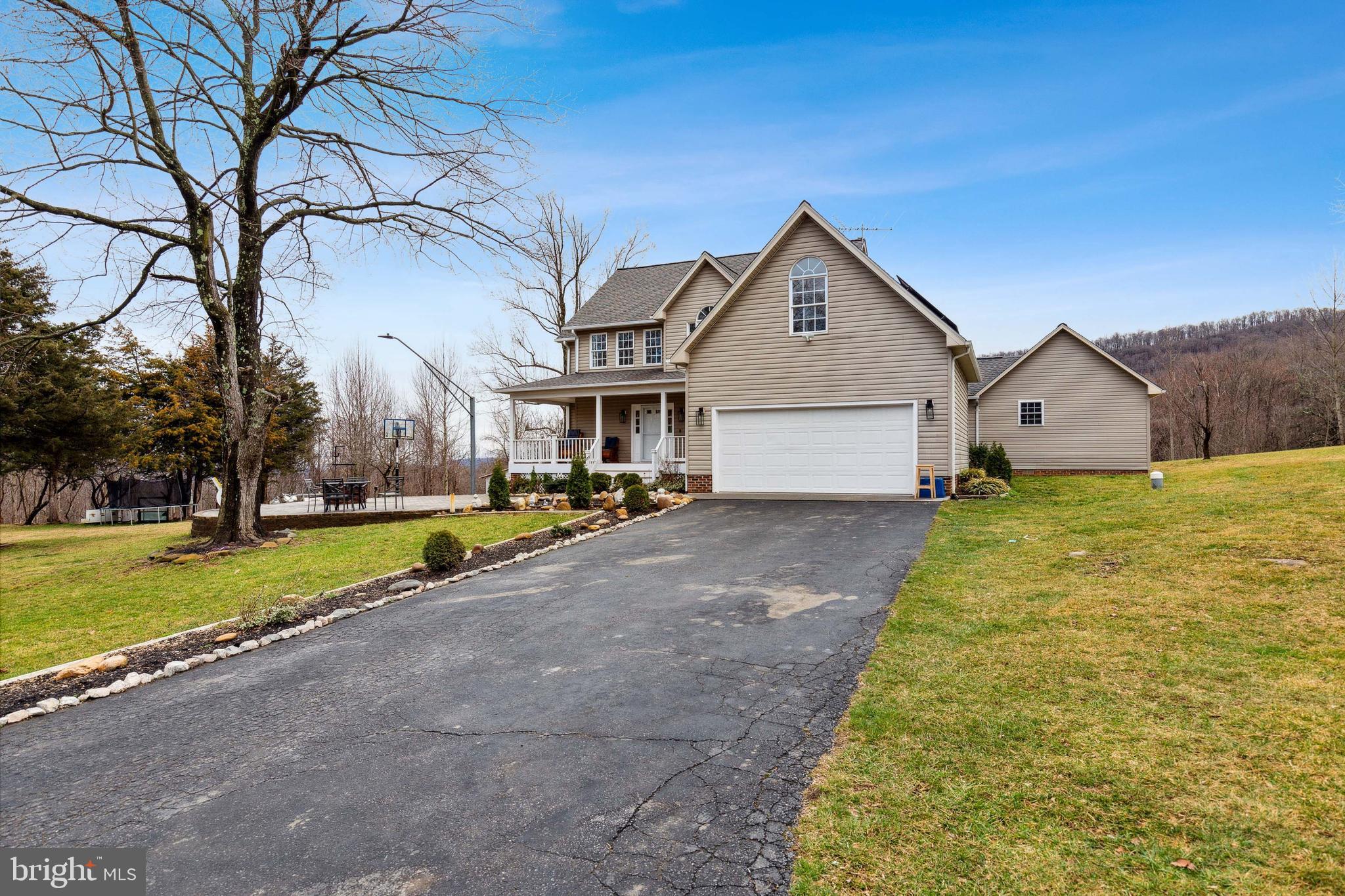 13157 Mt Paran Church Road Linden, VA 22642 - Photo 3 of 27 a view of a house with basketball court