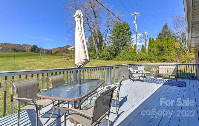 1423 Beaverdam Road Canton, NC 28716 - Photo 33 of 40 a view of a balcony with chairs