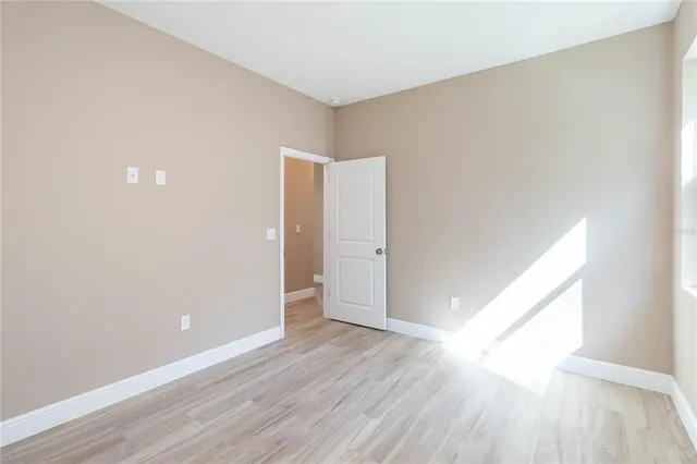 a view of backyard with green space