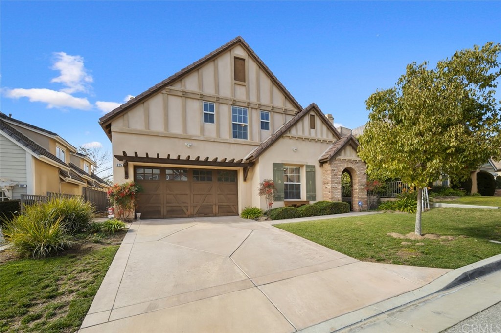 825 Cambridge Court Pasadena, CA 91107 - Photo 2 of 58 a front view of a house with a yard
