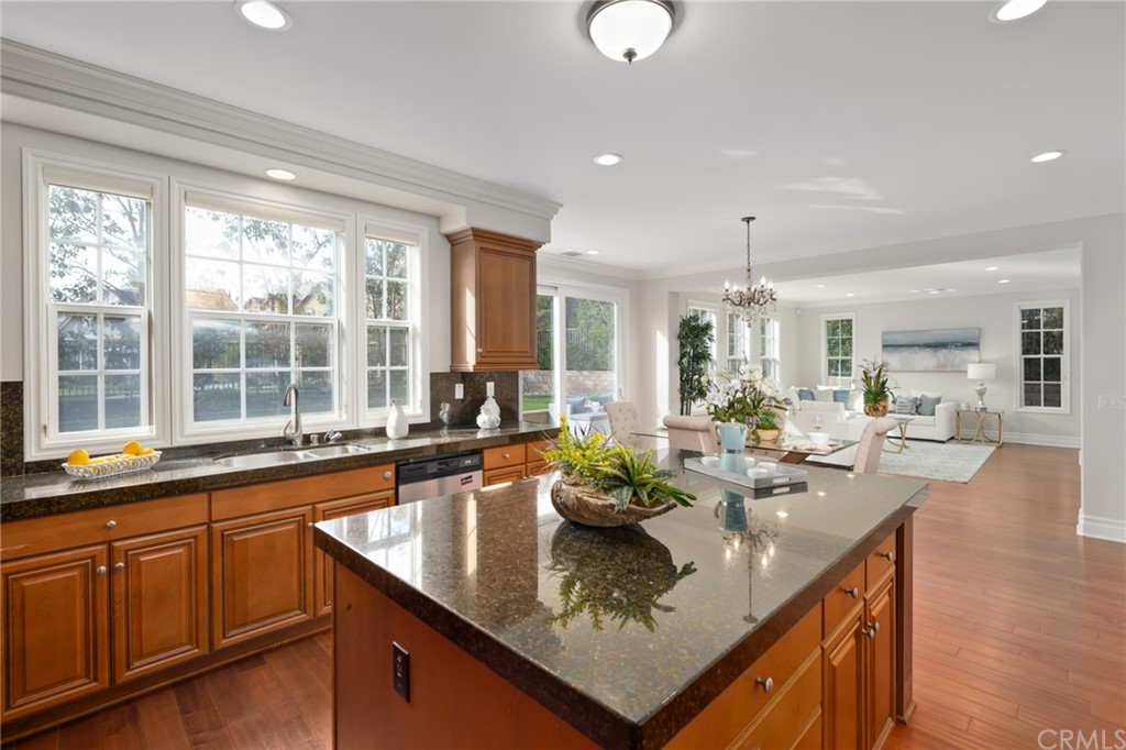 825 Cambridge Court Pasadena, CA 91107 - Photo 27 of 58 a living room with stainless steel appliances granite countertop a sink a counter space and living room view
