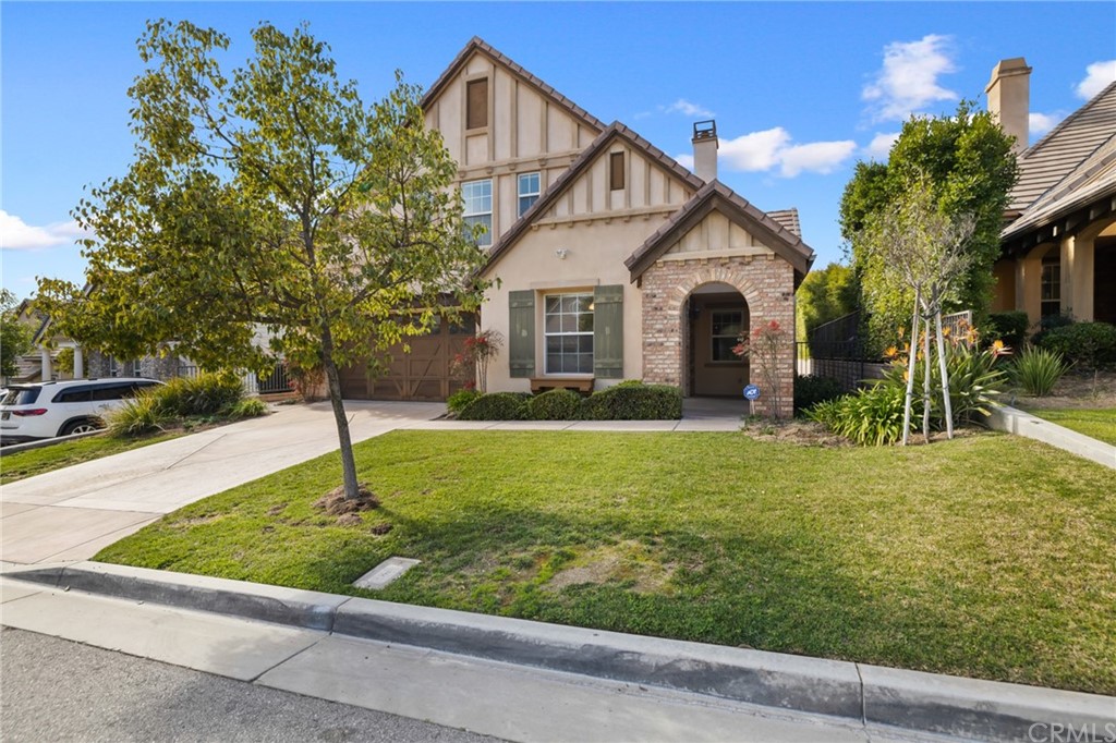 825 Cambridge Court Pasadena, CA 91107 - Photo 3 of 58 a front view of house with garden