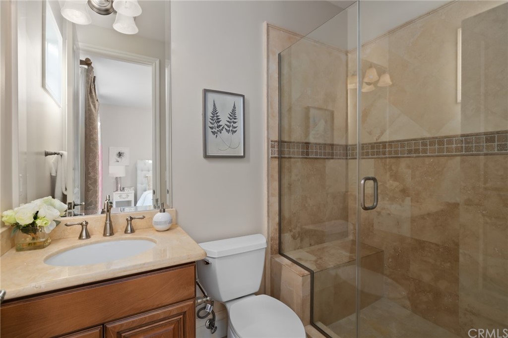 825 Cambridge Court Pasadena, CA 91107 - Photo 32 of 58 a bathroom with a sink toilet and shower