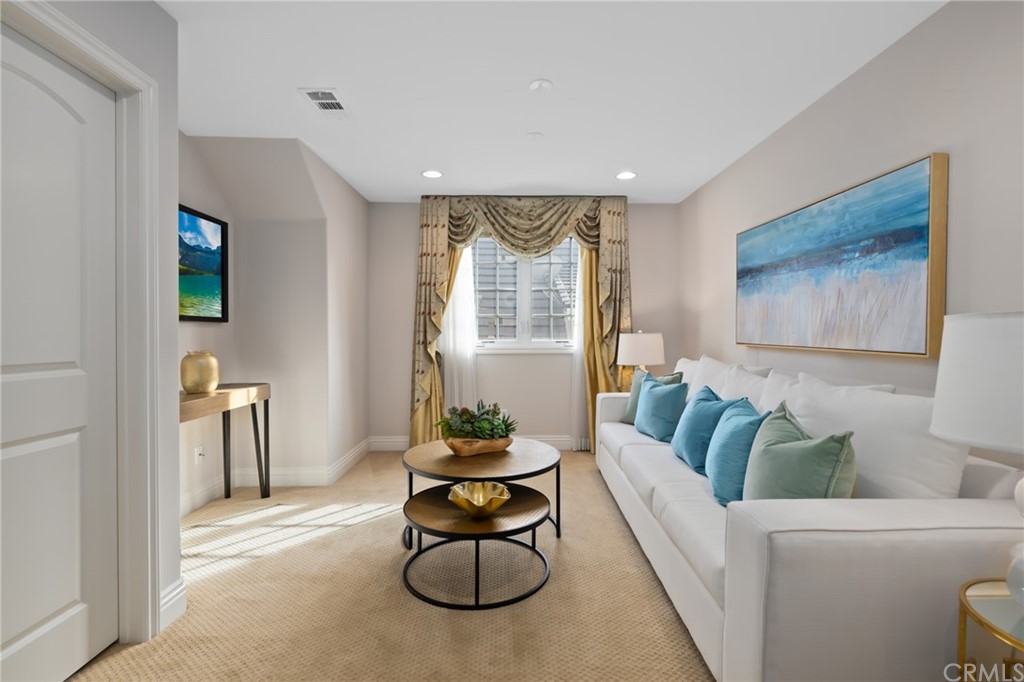 825 Cambridge Court Pasadena, CA 91107 - Photo 35 of 58 a living room with furniture and a large window