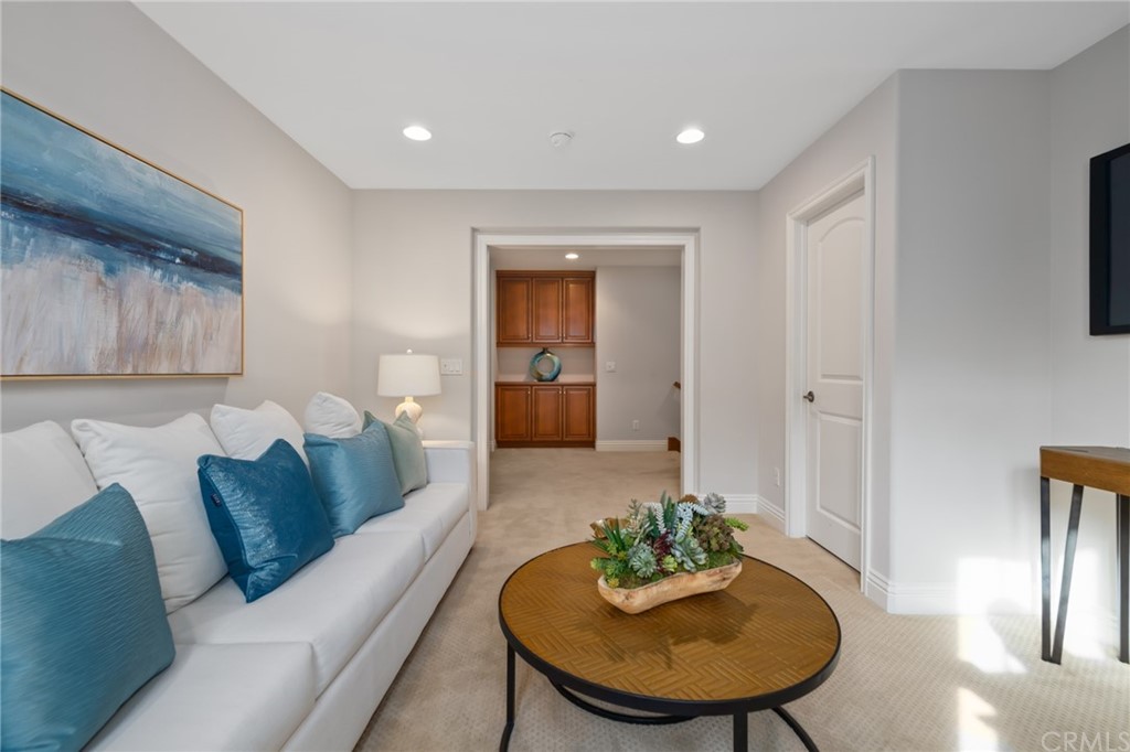 825 Cambridge Court Pasadena, CA 91107 - Photo 36 of 58 a living room with furniture and a wooden floor