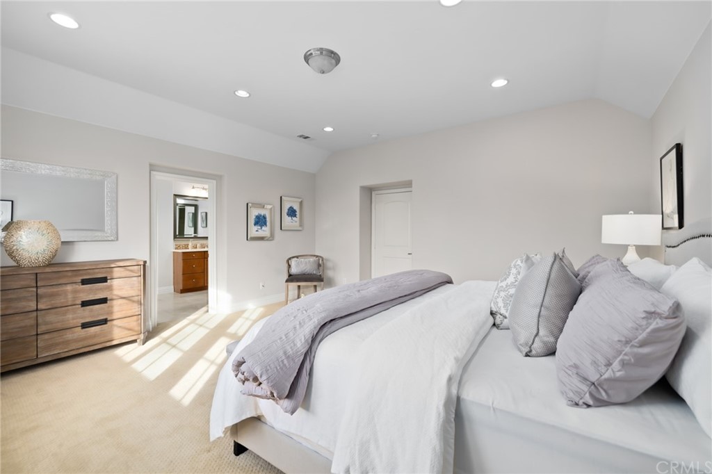 825 Cambridge Court Pasadena, CA 91107 - Photo 44 of 58 a bedroom with a bed and wooden floor