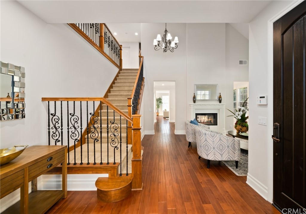 825 Cambridge Court Pasadena, CA 91107 - Photo 7 of 58 a living room with furniture and a wooden floor