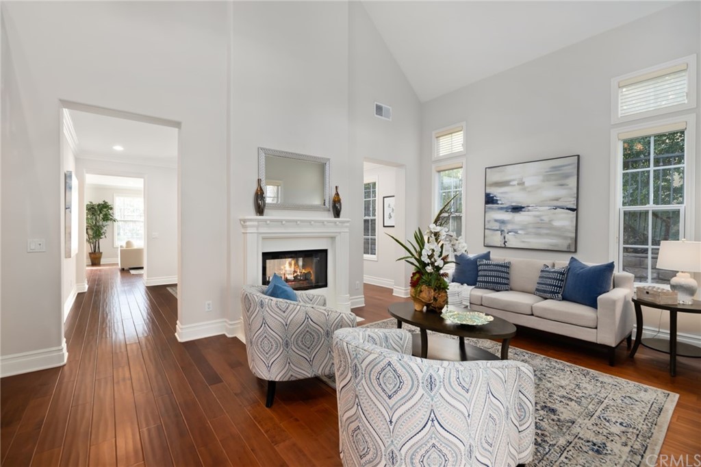 825 Cambridge Court Pasadena, CA 91107 - Photo 10 of 58 a living room with furniture and a fireplace