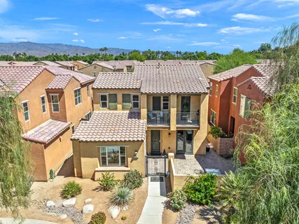an aerial view of a house with a garden