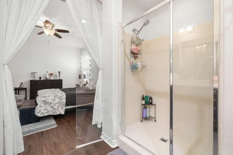 a spacious bathroom with a double vanity sink double and mirror