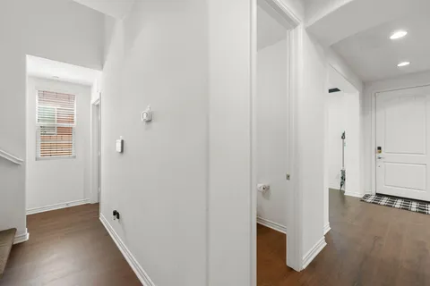 a bathroom with a toilet a sink and a mirror