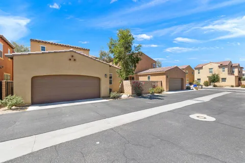 a front view of a house with a garage
