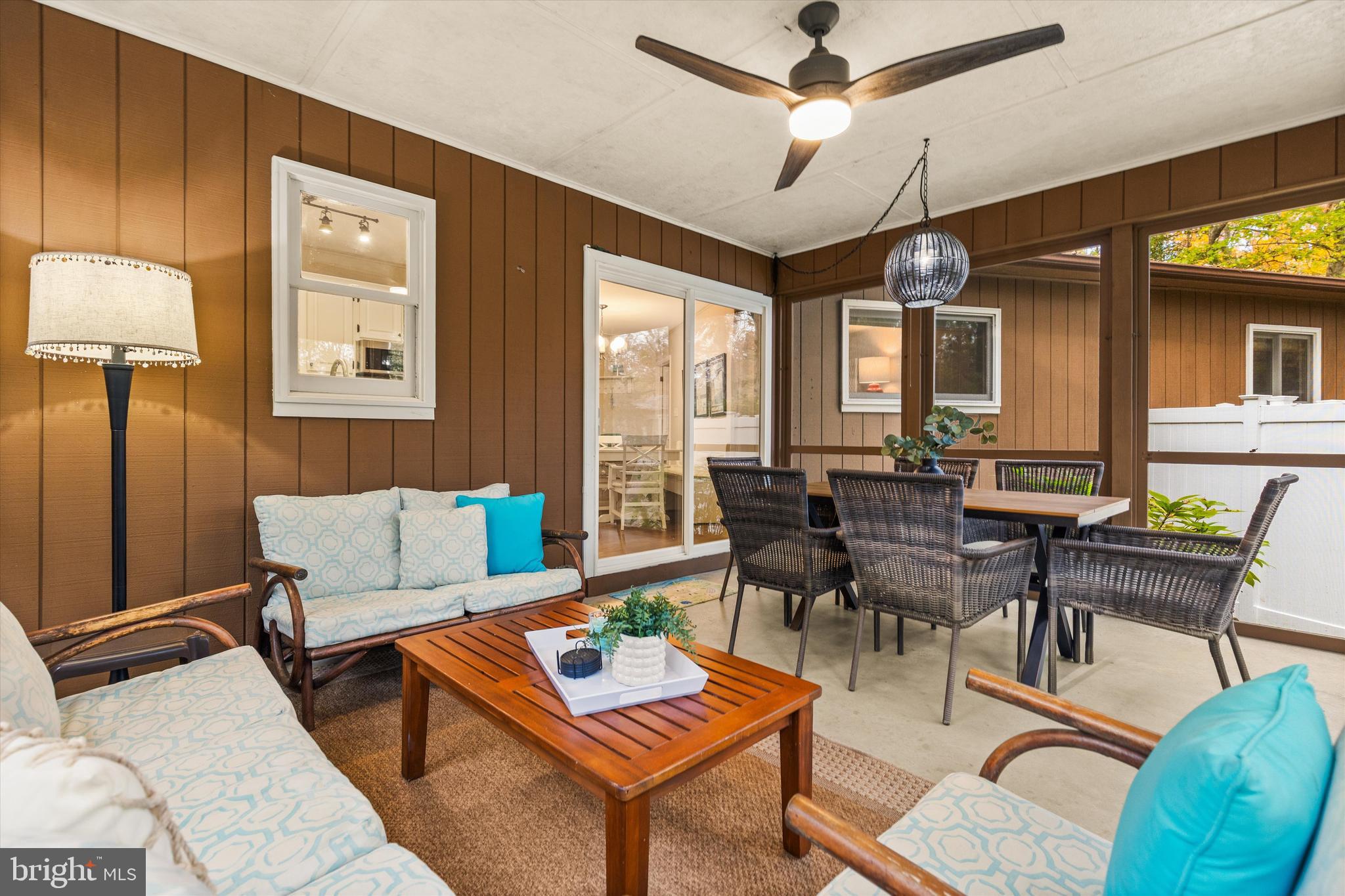 606 Spring Lake Court Bethany Beach, DE 19930 - Photo 18 of 53 a living room with furniture and a large window