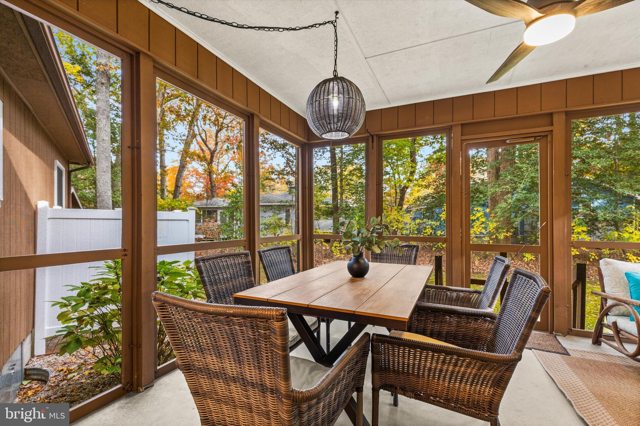 606 Spring Lake Court Bethany Beach, DE 19930 - Photo 19 of 53 a view of a dining room with furniture window and outside view