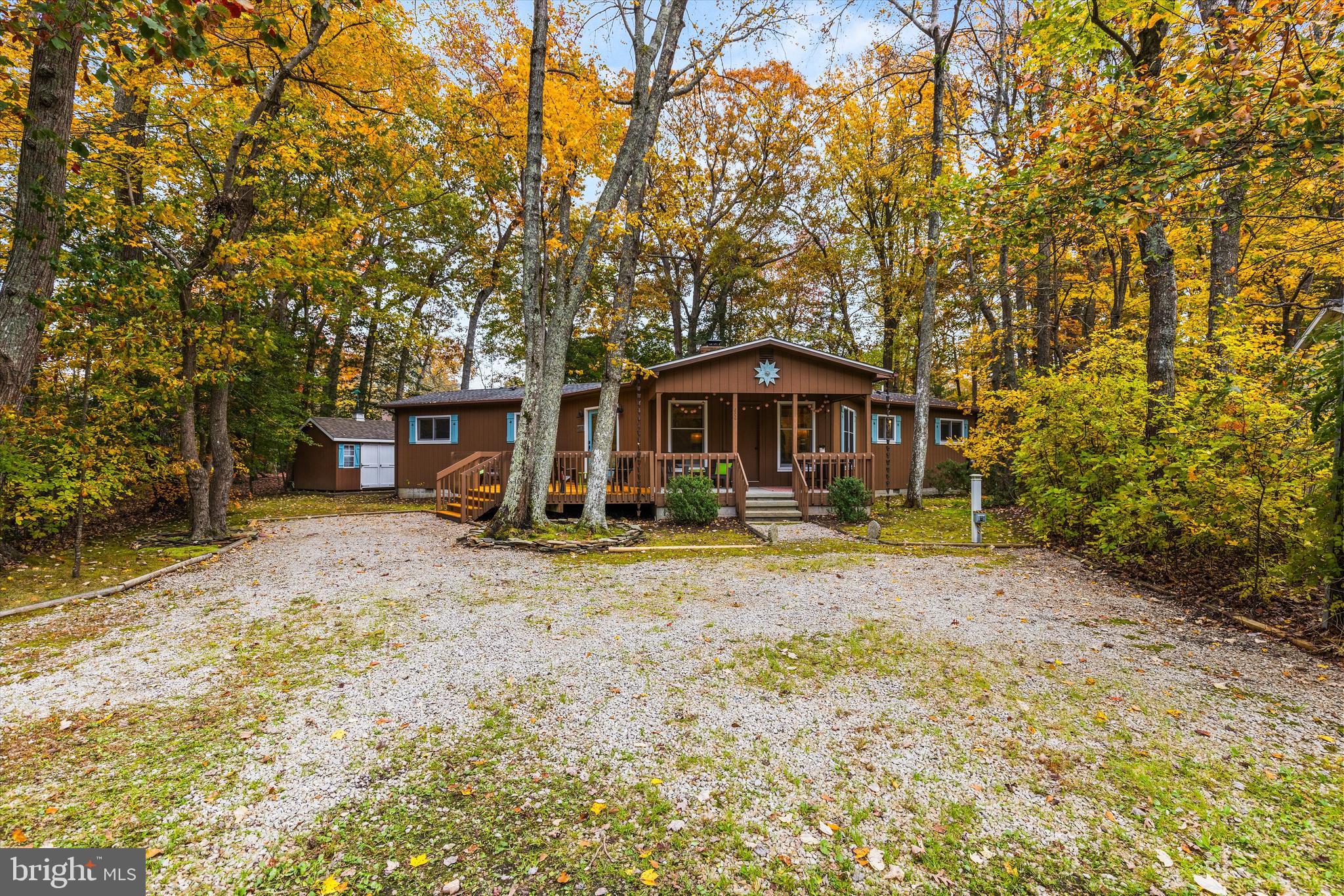 606 Spring Lake Court Bethany Beach, DE 19930 - Photo 2 of 53 a front view of a house with a yard