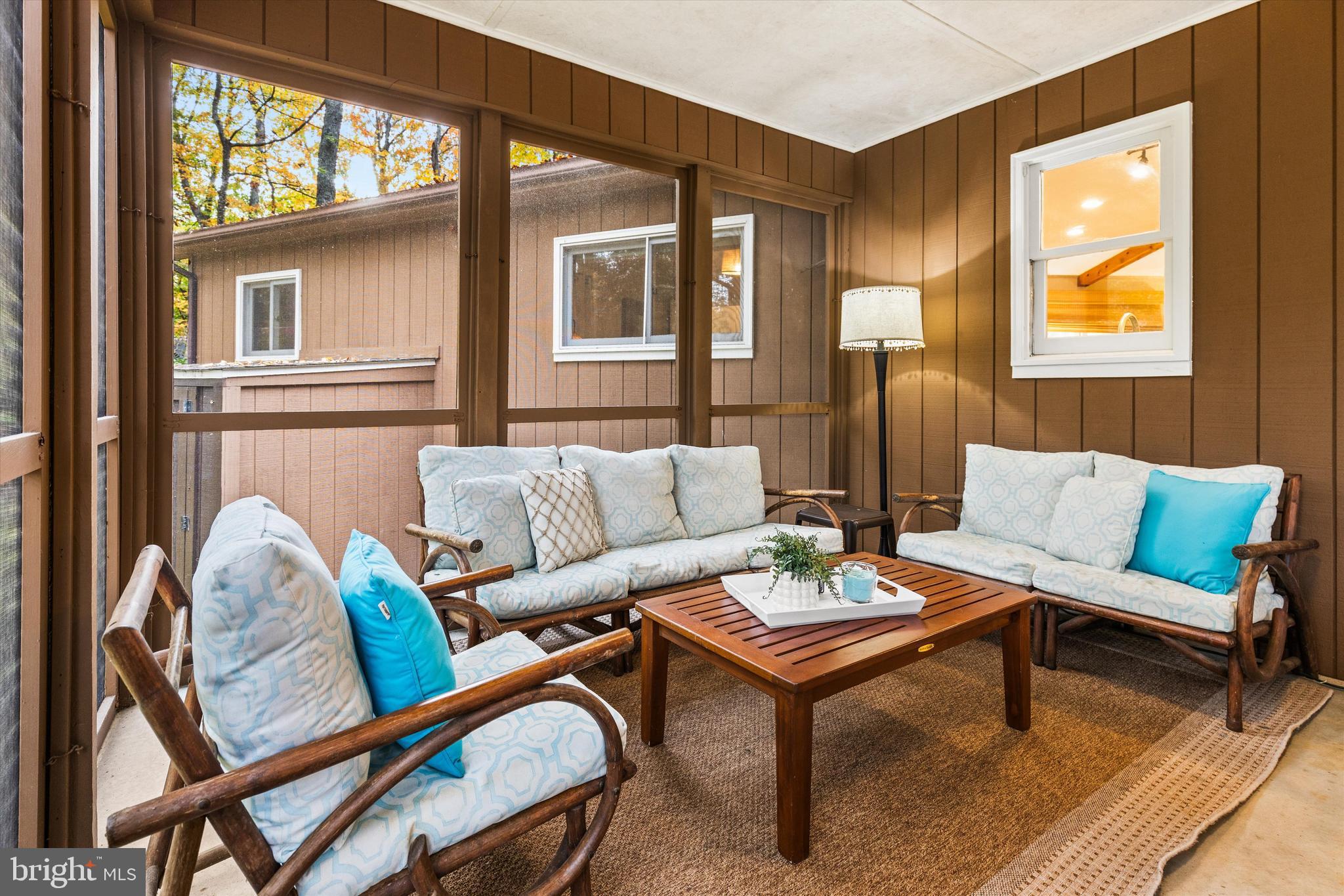 606 Spring Lake Court Bethany Beach, DE 19930 - Photo 21 of 53 a living room with furniture and a window