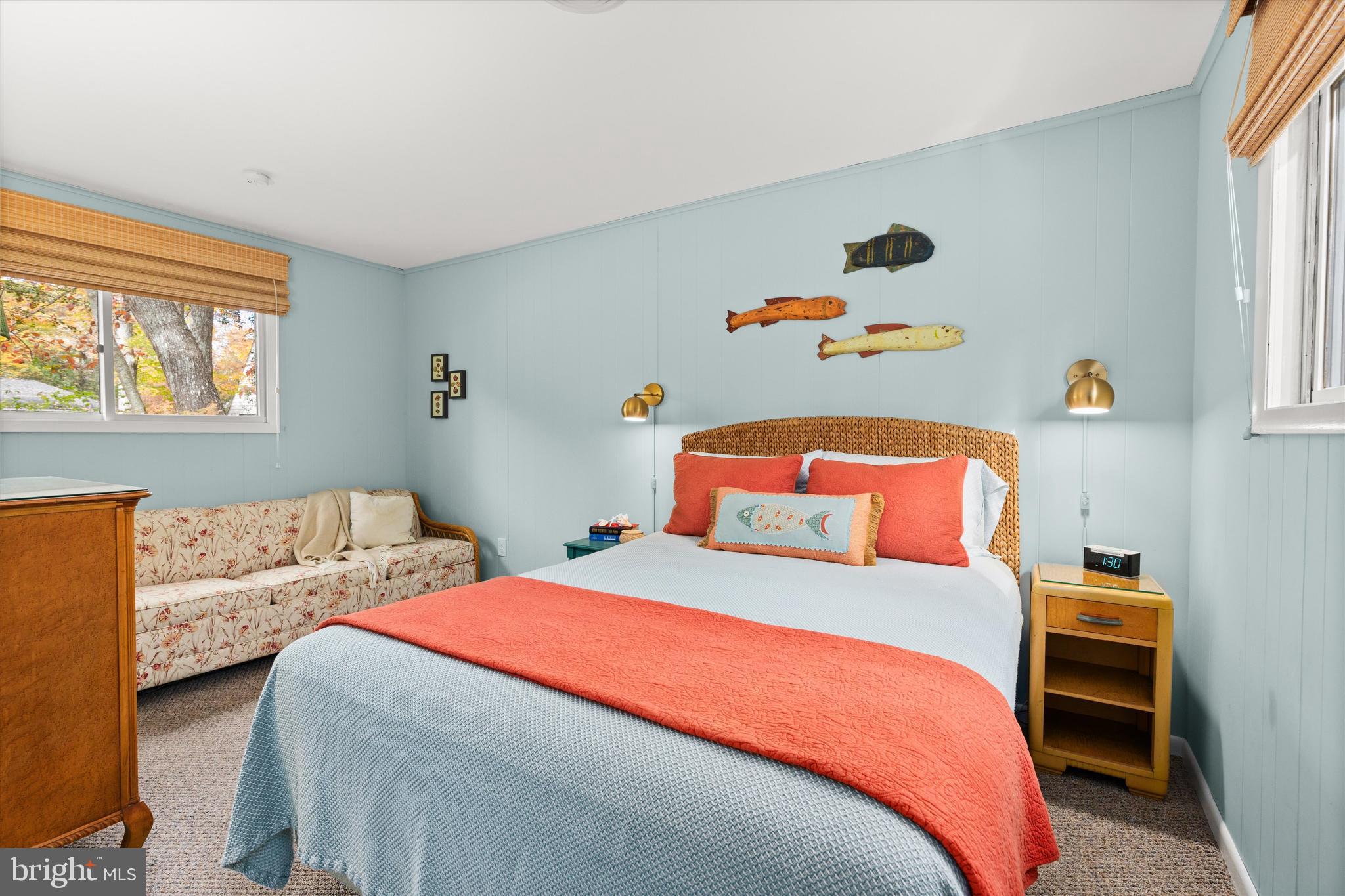 606 Spring Lake Court Bethany Beach, DE 19930 - Photo 22 of 53 a bedroom with a bed and a window