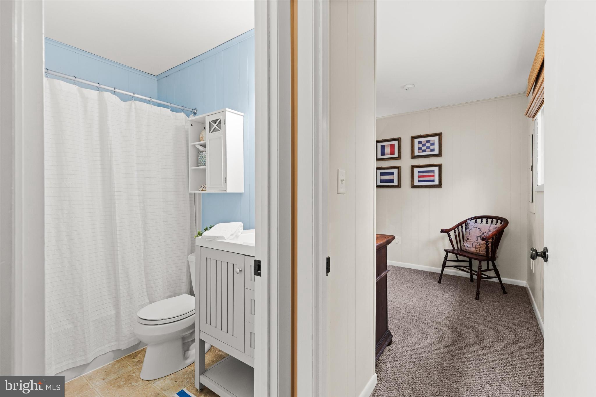 606 Spring Lake Court Bethany Beach, DE 19930 - Photo 33 of 53 a bathroom with a toilet a sink and a shower
