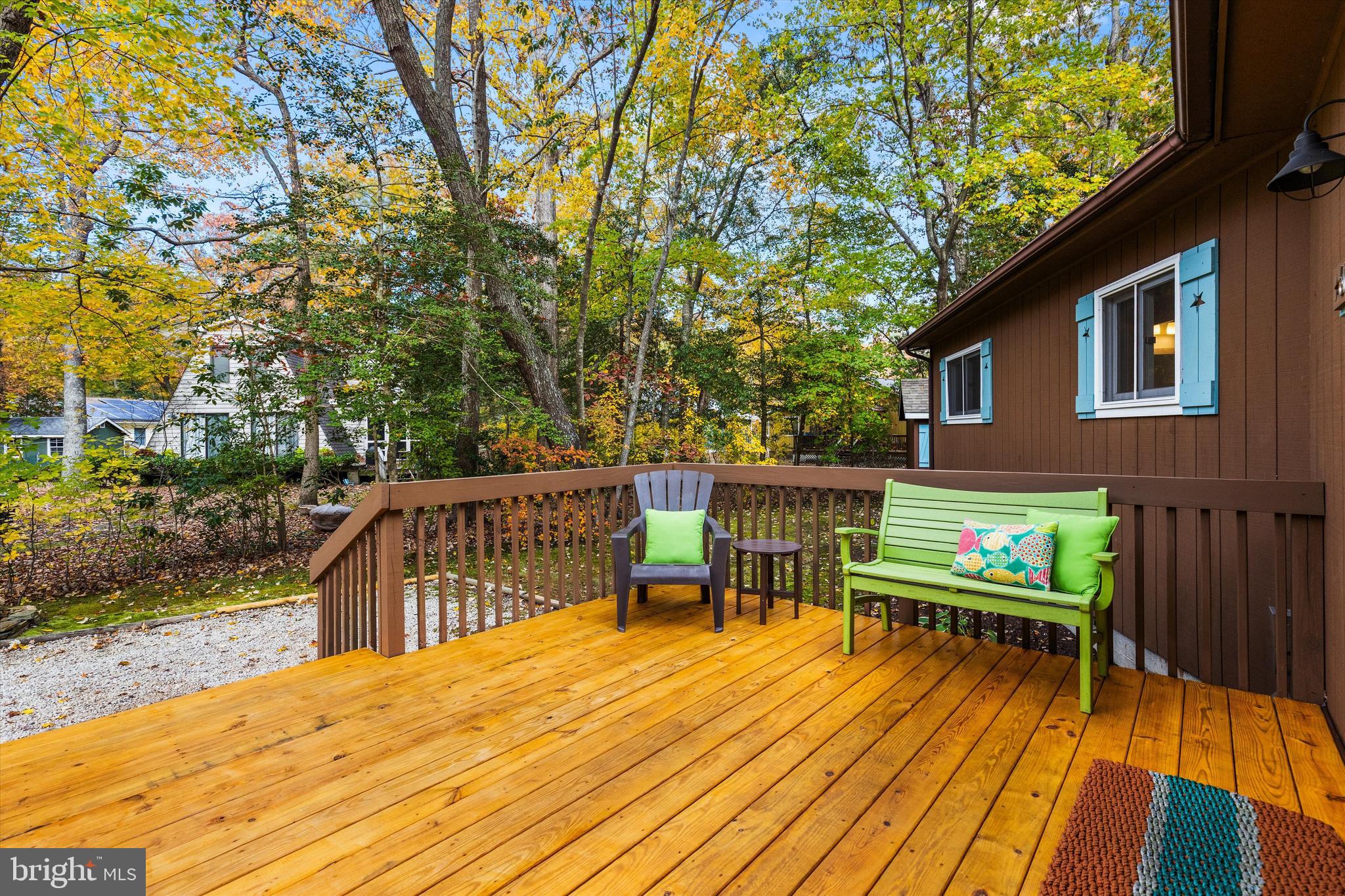 606 Spring Lake Court Bethany Beach, DE 19930 - Photo 38 of 53 a view of a chairs and table on the wooden floor