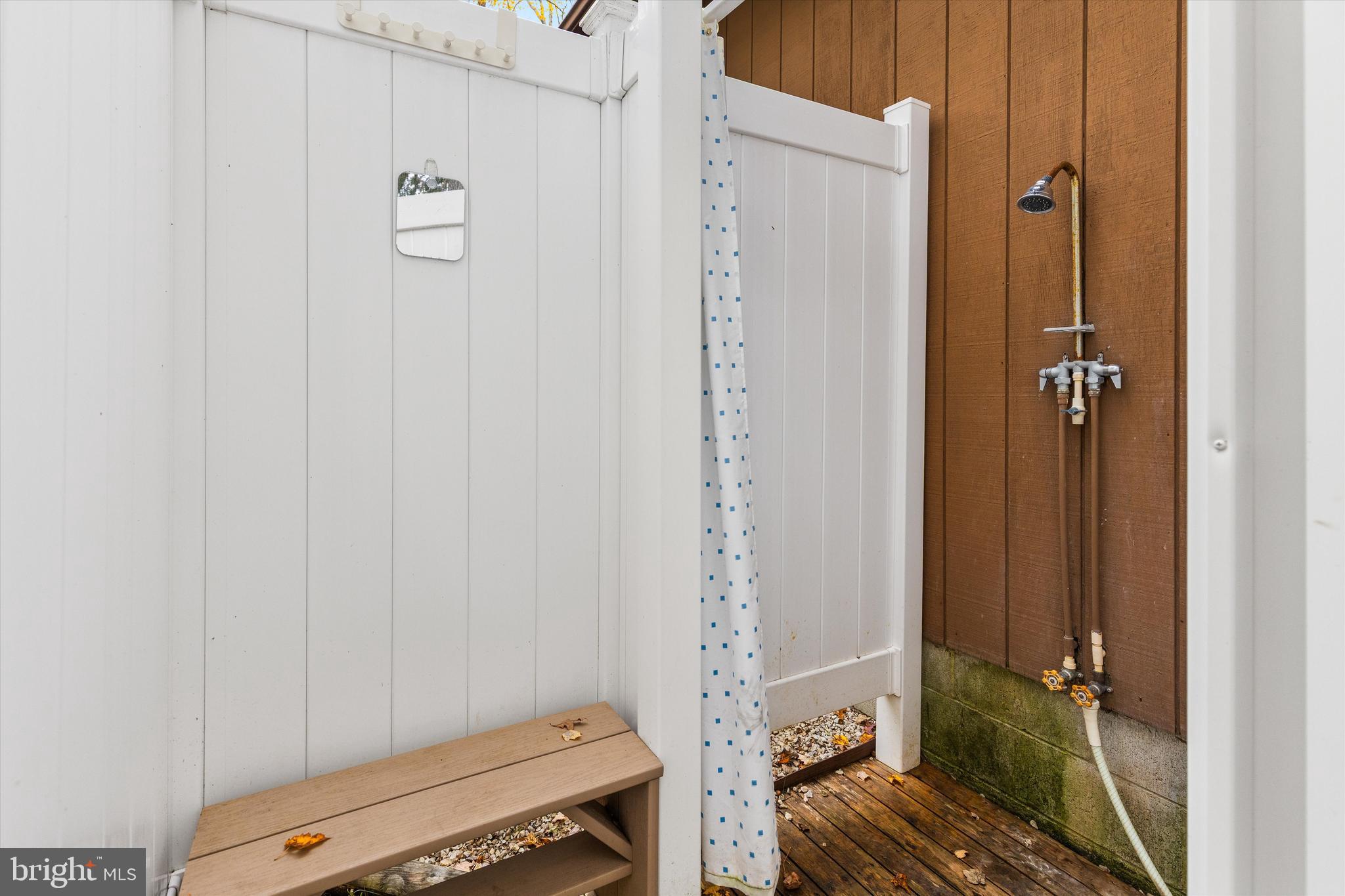 606 Spring Lake Court Bethany Beach, DE 19930 - Photo 44 of 53 a bathroom with a window and a toilet