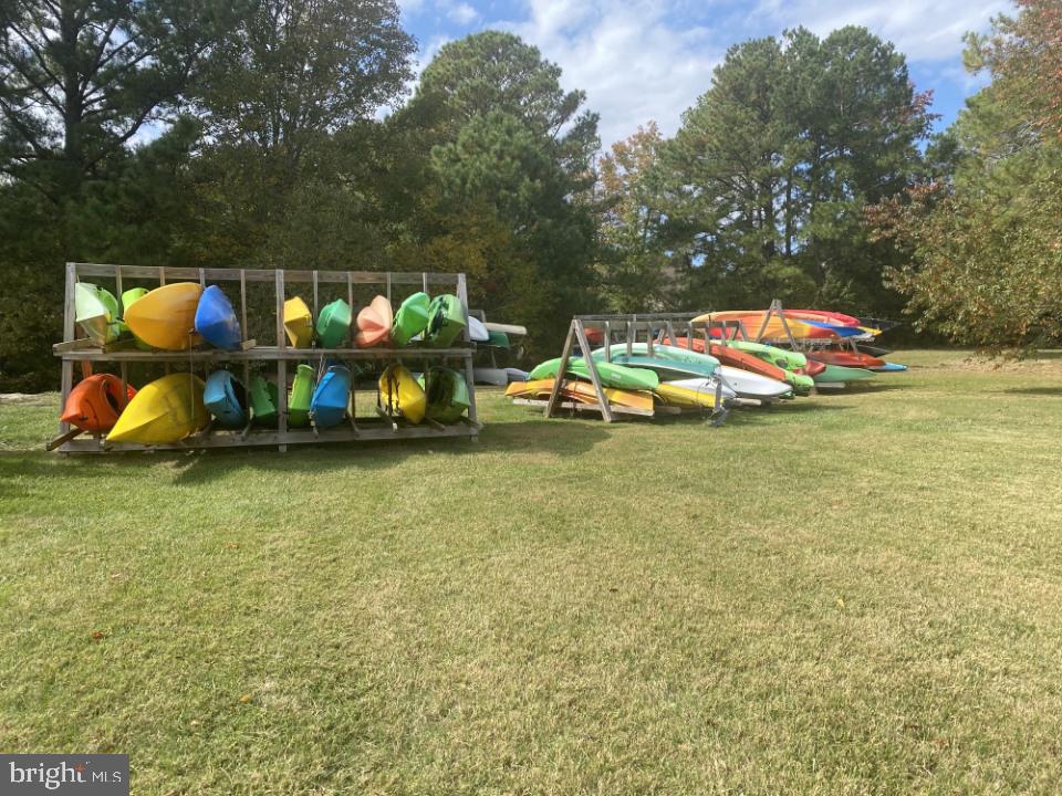 606 Spring Lake Court Bethany Beach, DE 19930 - Photo 52 of 53 a childrens park with lots of swings and slides